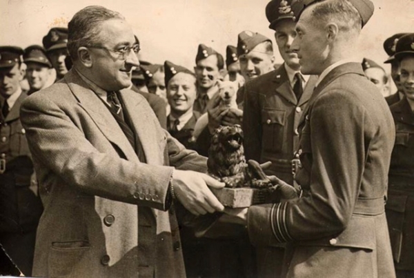 Presentation of the Lion - May 1943 by Mr. Echkman, from MGM presenting a bronze Lion to W/C Burnside
